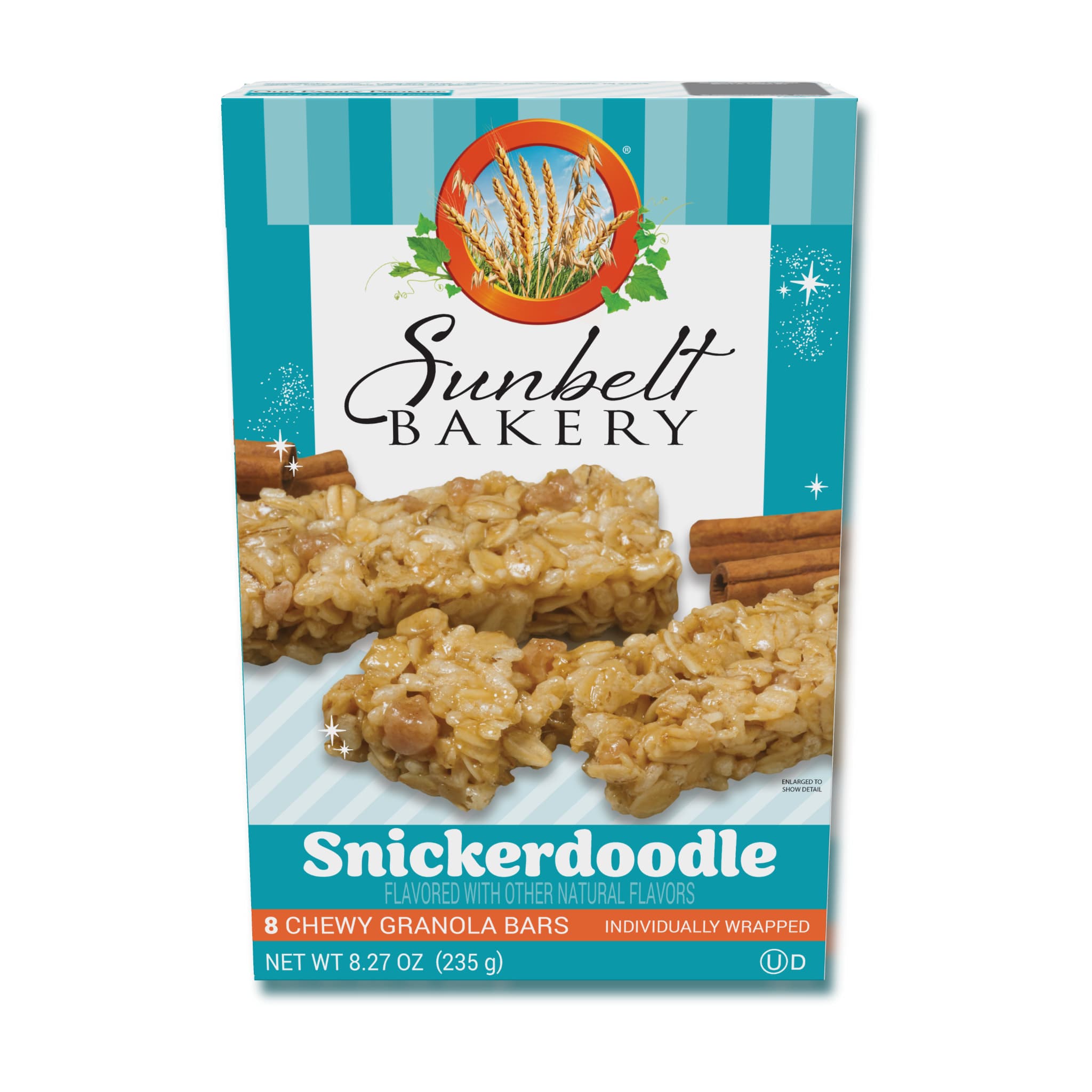 A box of Sunbelt Bakery Snickerdoodle Chewy Granola Bars is shown. The packaging features the Sunbelt Bakery logo at the top with an illustration of a wheat field inside an orange circle. The front of the box prominently displays the product name "Snickerdoodle" in large, bold white letters on a teal background. Below the product name, it states "Flavored with other natural flavors." There are images of granola bars and cinnamon sticks on the front. 